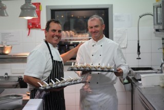 Minister Hames handles the heat in the kitchen